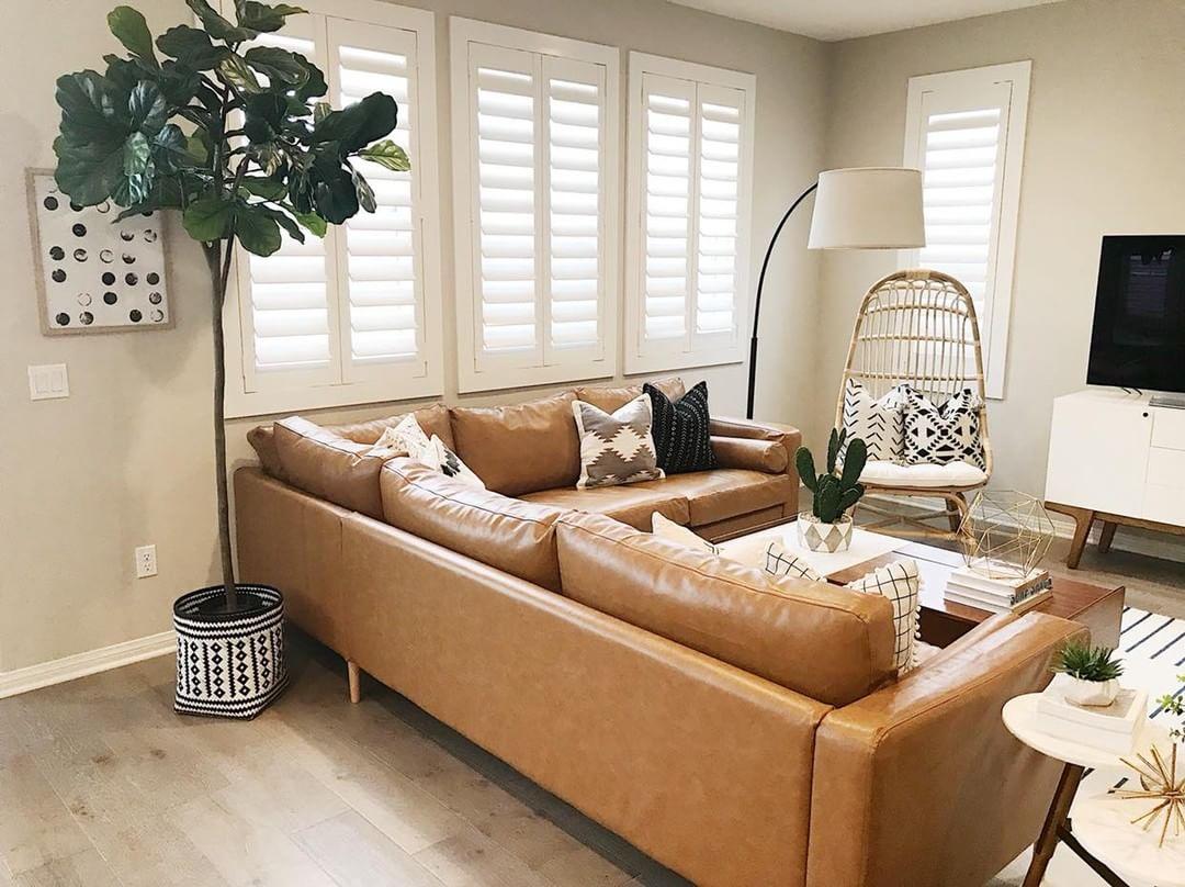 Cozy living room with our Polywood shutters in Virginia Beach.